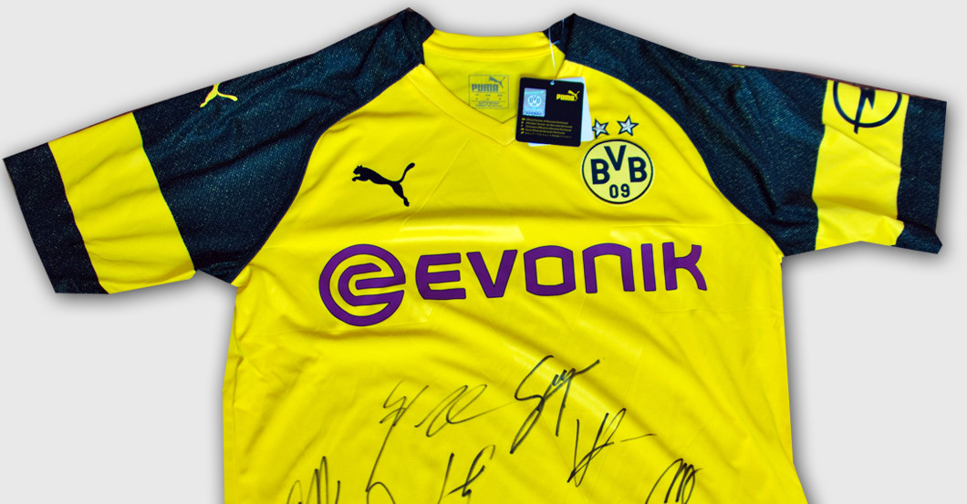 Borussia Dortmund stiftet teamsigniertes Trikot zu Weihnachten