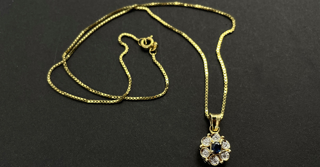 UC Goldkette Anhänger   UC Goldkette Anhänger