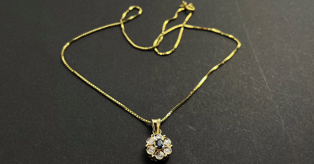 UC Goldkette Anhänger   UC Goldkette Anhänger