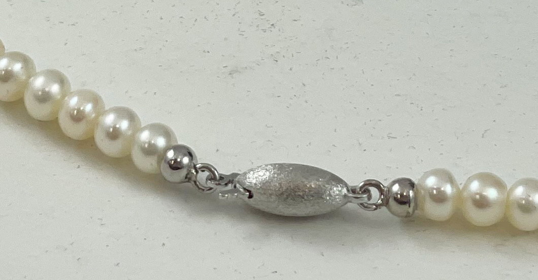  UC Kette Perlen 
