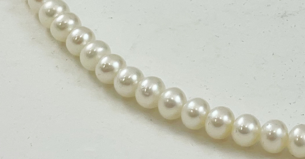  UC Kette Perlen 